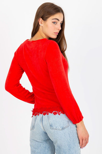 Chic back view of a sumptuous red wool blouse featuring delicate lace trims, exuding sophistication for any upscale event.