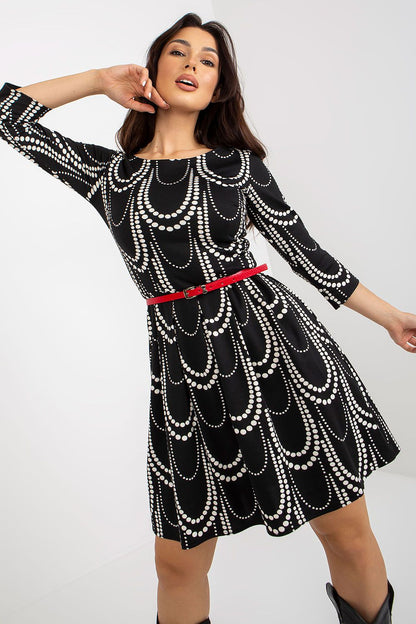 Elegant 3/4 sleeve daydress by Lakerta featuring a luxurious cotton blend with a stylish black and white pearl pattern, complemented by a vibrant red belt.