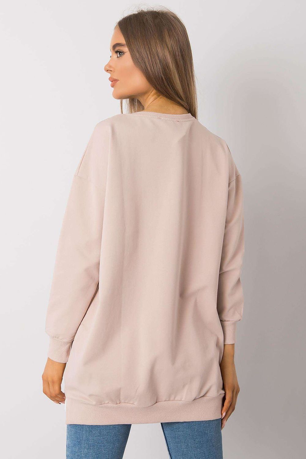 Back view of an exquisite long-sleeve tunic by Rue Paris, highlighted in soft fabric with a minimalist design, perfect for a stylish yet comfortable look.