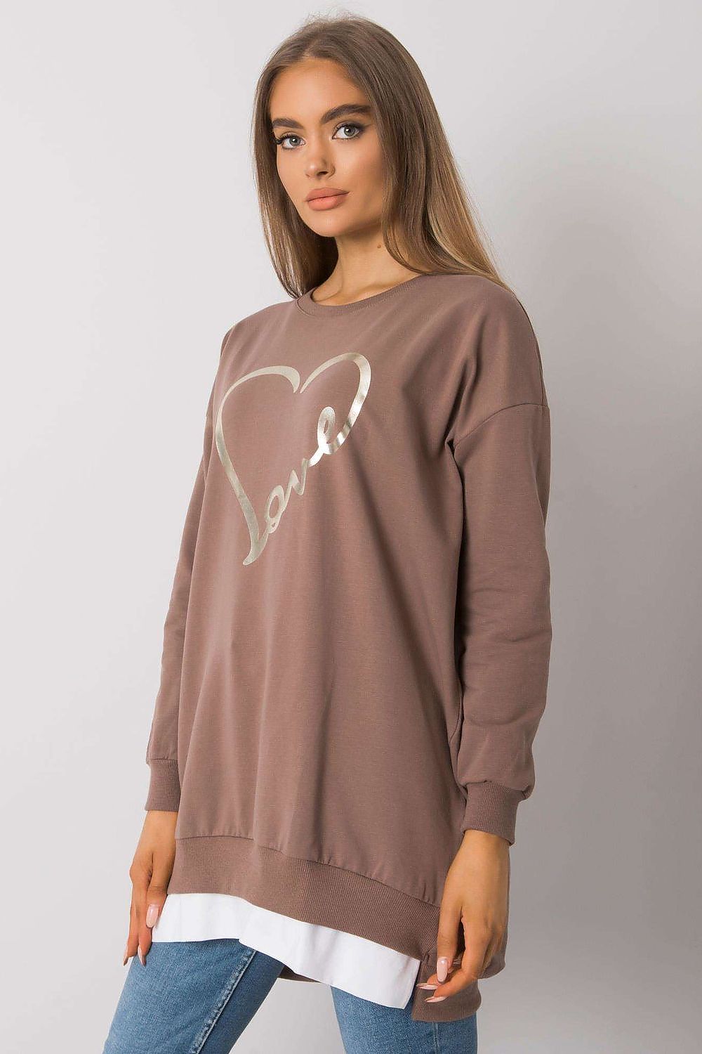 Fashionable brown tunic showcasing a silver heart print with 'love', perfectly paired with denim, epitomising effortless luxury style.