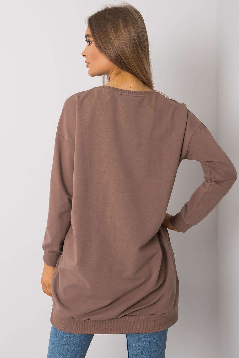 Chic brown tunic seen from the back, designed with luxurious fabrics and a flowing silhouette, embodying modern elegance.