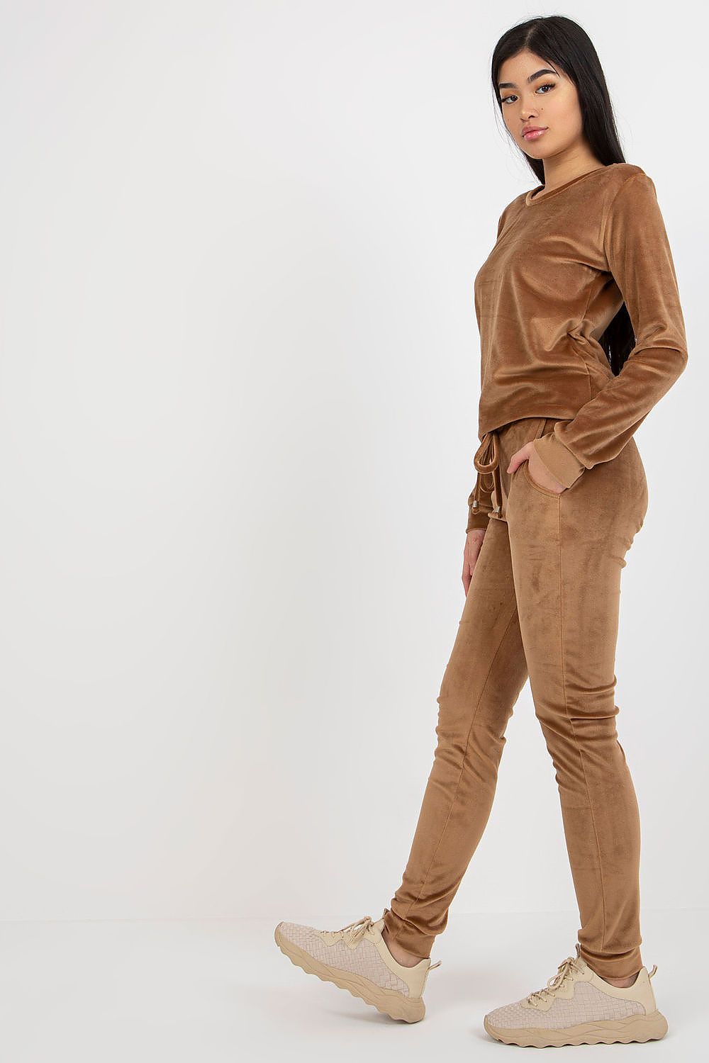 Side view of a stunning velour blouse and pants set by Rue Paris, showcasing the soft texture and fitted design, perfect for chic yet comfortable wear.