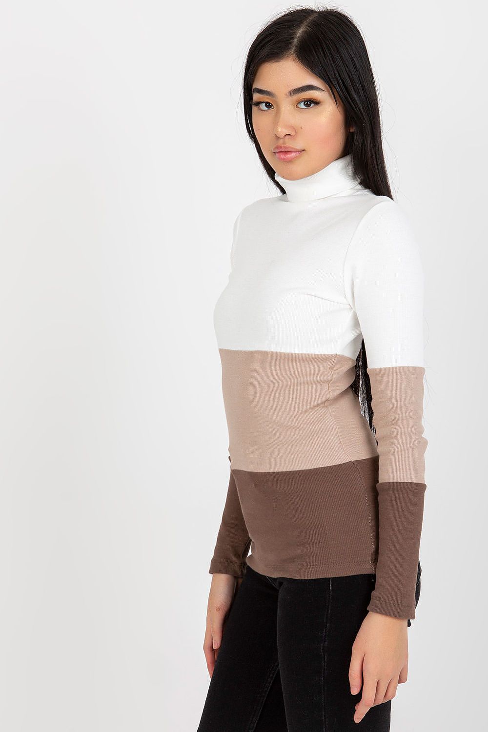 Stylish ribbed turtleneck sweater in cream and brown, displayed on model to emphasize its slender fit and luxury design.