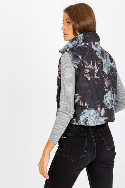View of the floral quilted insulated vest from the back, showcasing its fashionable design and high collar.