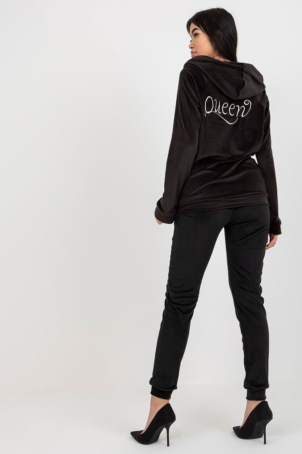 Sophisticated black velour tracksuit with an embroidered 'Queen' design, featuring a trendy hoodie and tailored pants, ideal for women seeking luxury and comfort in their casual wardrobe.