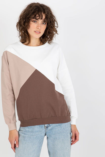 Charming side profile of a fashionable women's long sleeve sweatshirt, designed with a unique triangular colour-block pattern in muted tones, perfect for contemporary wardrobes.