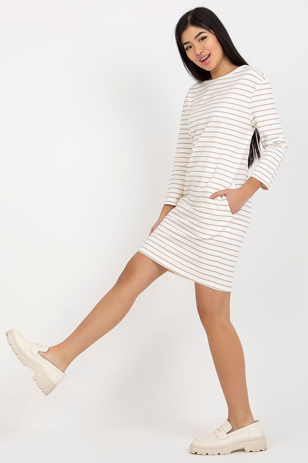 Elegant Stripe Daydress with Long Sleeves and Slip Pockets by Rue Paris displayed on a mannequin, showcasing its straight cut and stylish design.