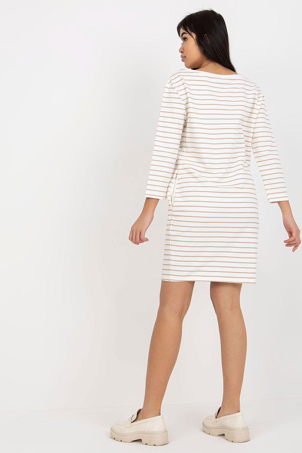 Close-up view of the Elegant Stripe Daydress with Long Sleeves and Slip Pockets by Rue Paris, highlighting the premium striped fabric and round neckline.