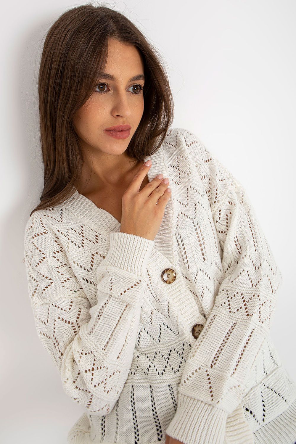 Elegant Luxurious Openwork Button-Down Cardigan in Cotton and Spandex by Rue Paris draped over a stylish outfit.