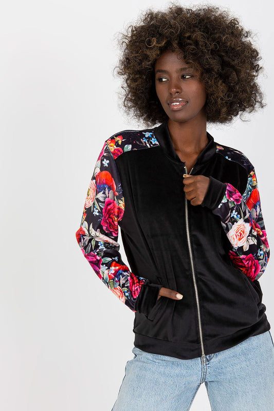 Luxurious Velour Bomber Jacket by Rue Paris, showcasing a vibrant floral design and elegant zipper closure, perfect for stylish winter wear.