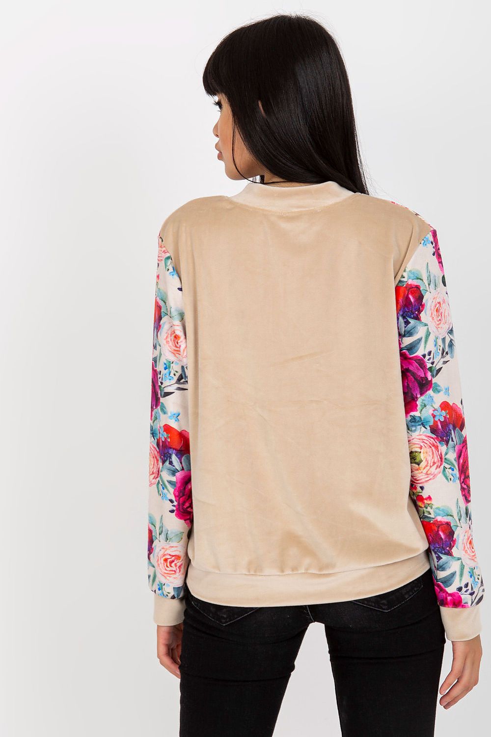 Close-up of the Luxurious Velour Bomber Jacket by Rue Paris highlighting its exquisite colourful floral pattern and high-quality fabric.
