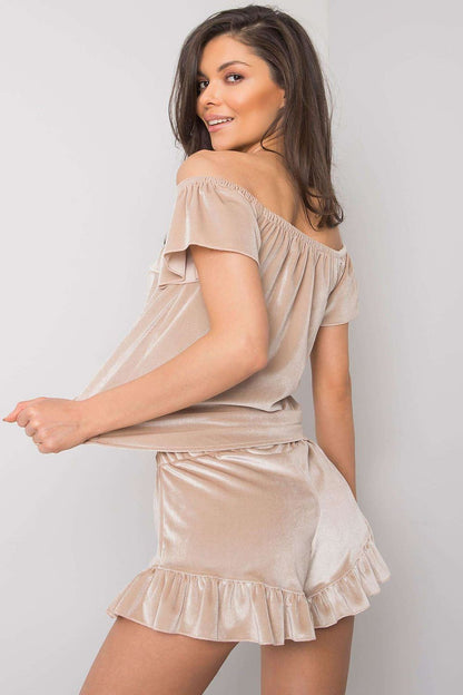 Elegant Luxurious Velour Women's Pajamas Set with Spanish Neckline and Decorative Frills worn by model, exuding comfort and style from Rue Paris.