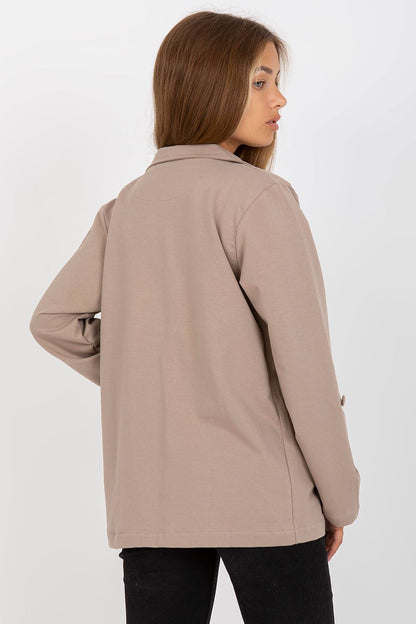 Lifestyle image of a model wearing Luxurious Cotton Blend Long-Sleeved Sweat Jacket with Button Closure and Slip Pockets by Rue Paris in a chic setting.
