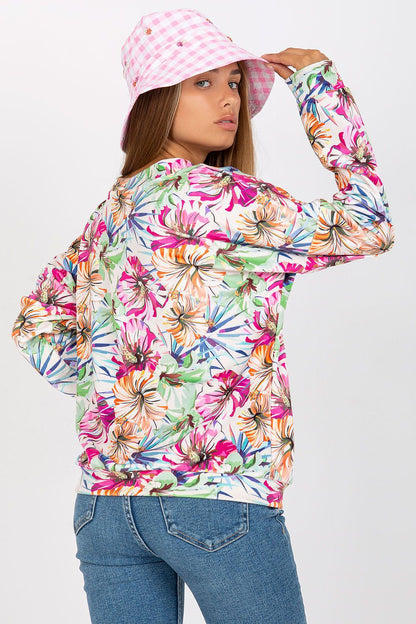 Close-up of the heart neckline detail on the vibrant velour sweatshirt by Rue Paris, showcasing a blend of 90% viscose and 10% spandex for comfort.