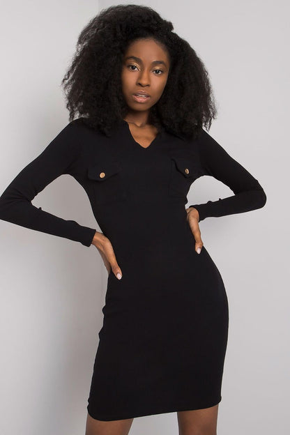 Close-up of the Elegant Ribbed Pencil Cut Dress with Heart Neckline and Long Sleeves by Rue Paris, highlighting the ribbed texture and heart-shaped neckline for a sophisticated look.