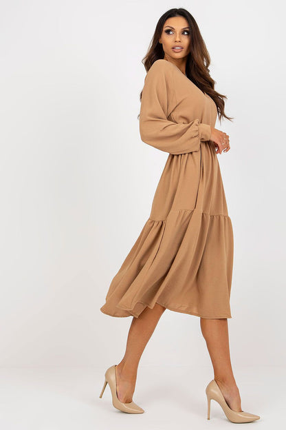 Och Bella Casual Long Sleeve Dress with Heart Neckline and Frill Trim in an elegant setting, showcasing its refined design for perfect everyday wear.