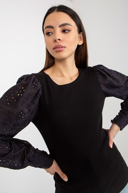 Detailed view of Och Bella Elegant Cotton Blouse showcasing intricate openwork long sleeves and round neckline.