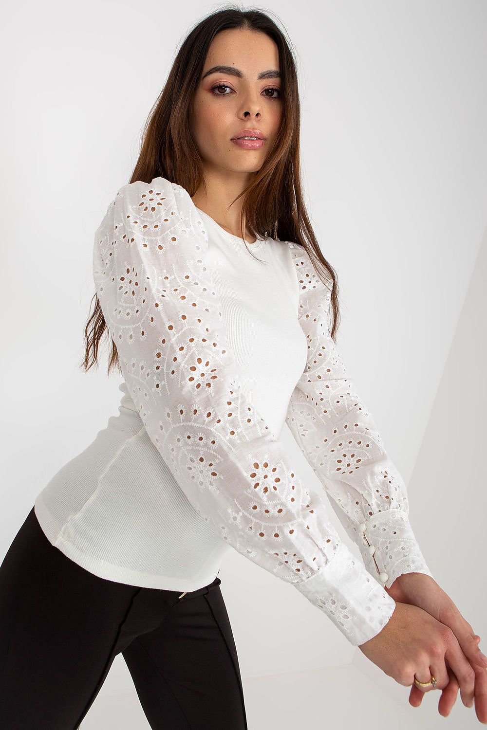 Close-up view of Och Bella Elegant Cotton Blouse with Openwork Long Sleeves and Round Neckline, highlighting the fine cotton fabric and elegant craftsmanship.
