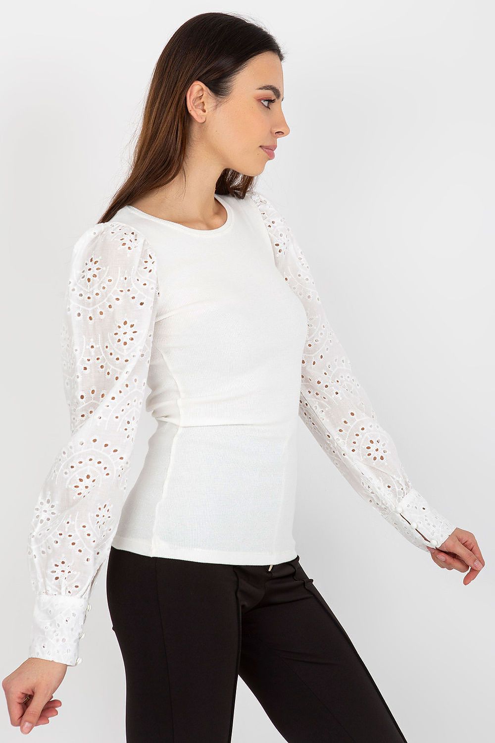 Model wearing Och Bella Elegant Cotton Blouse with Openwork Long Sleeves and Round Neckline, featuring a stylish and sophisticated look perfect for various occasions.