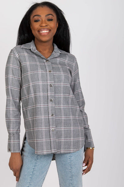 Luxurious Dark Pink Plaid Long Sleeve Shirt for Women by Lakerta displayed on a hanger, revealing its sophisticated buttoned design.