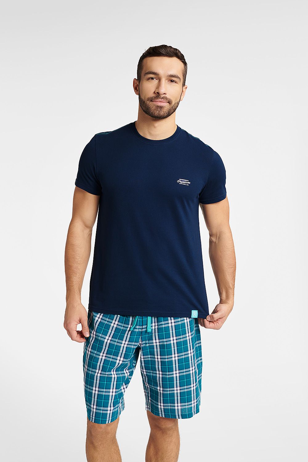Luxury Henderson Men's Cotton Pyjamas Set featuring a short sleeve top and checkered shorts, designed for ultimate comfort and style.