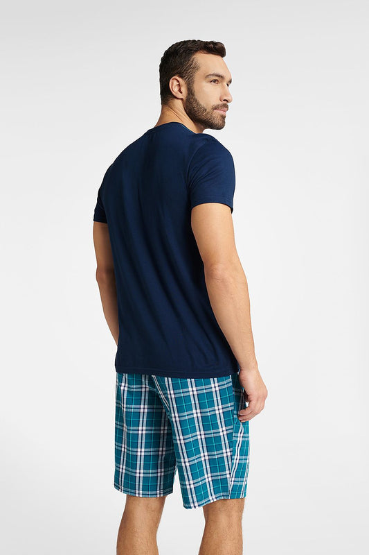Luxury Henderson Men's Cotton Pyjamas Set showcasing a close-up view of the soft cotton fabric and stylish checkered shorts.
