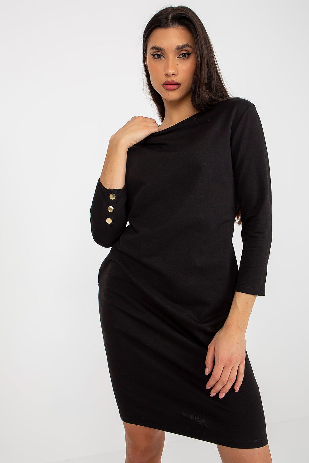 Detail view of the Och Bella 3/4 Sleeve Tracksuit Dress highlighting stylish decorative buttons and slip pockets.