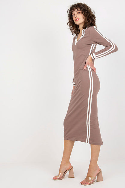 Model wearing the Elegant Pencil Cut Daydress with Long Sleeves and V-Neck, styled for a chic, sophisticated look suitable for day or evening.