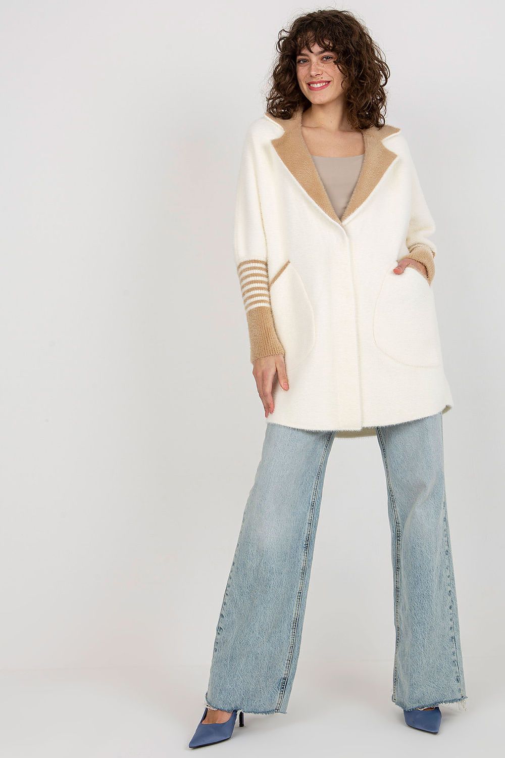 Close-up view of the Luxurious Women's Long Sleeve Wool Blend Coat with large pockets and press stud fastening highlighting the rich texture.