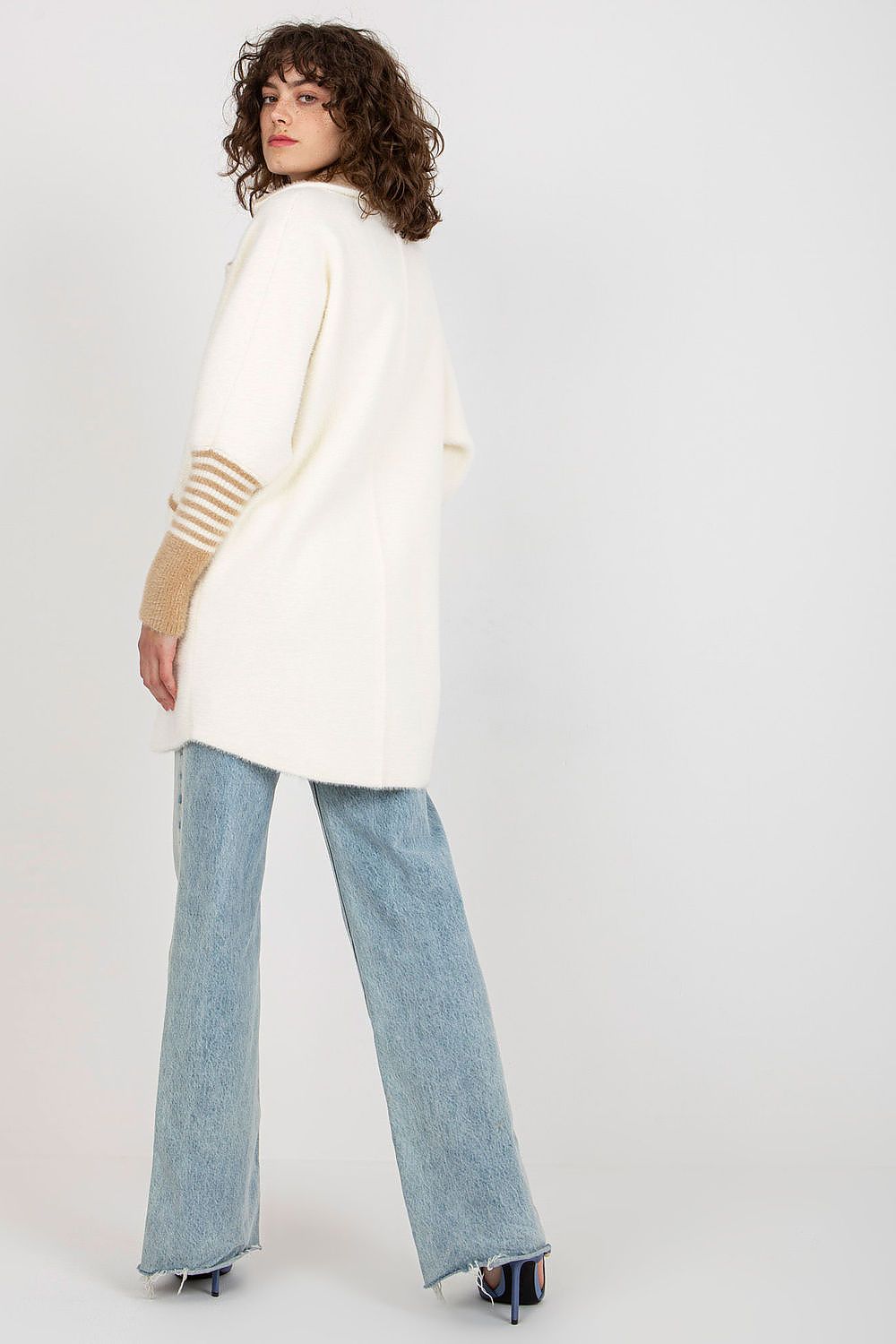 Side view of the Luxurious Women's Long Sleeve Wool Blend Coat showcasing the stylish design and large slip pockets.