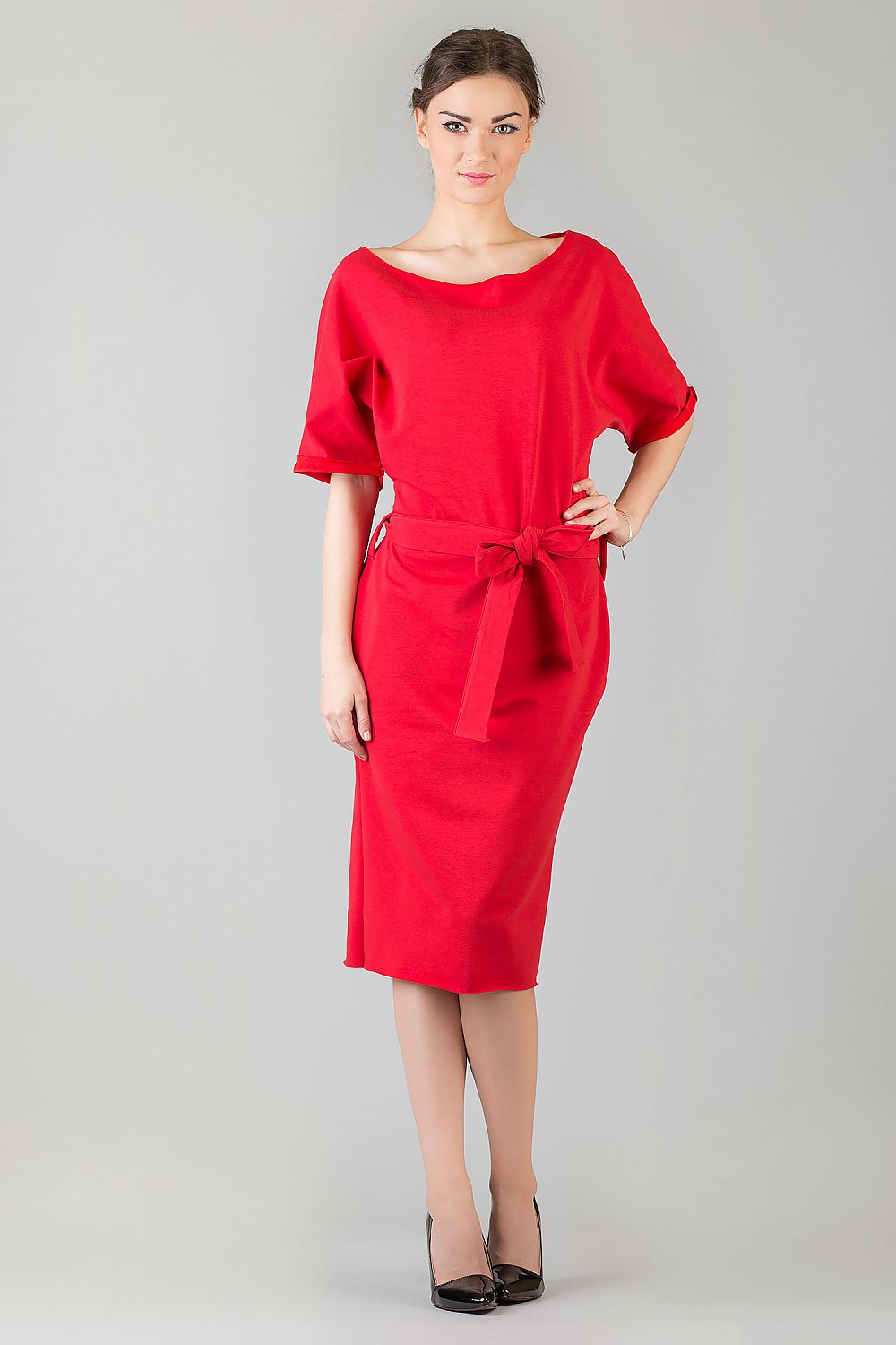 Chic and elegant Tessita Daydress with a unique loose kimono fit, beautifully crafted pockets, and artistic cuff details, enhancing your wardrobe.