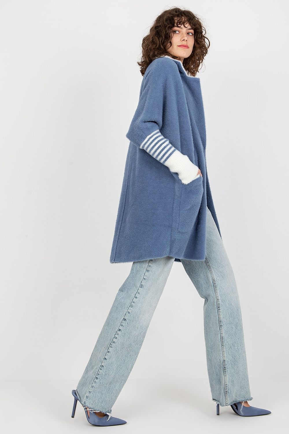 Luxurious Women's Long Sleeve Wool Blend Coat with Large Pockets and Press Stud Fastening - Elegant design showcased in a stylish outdoor setting.