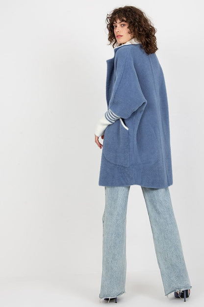 Close-up of the Luxurious Women's Long Sleeve Wool Blend Coat with Large Pockets and Press Stud Fastening, highlighting the exquisite fabric and craftsmanship.