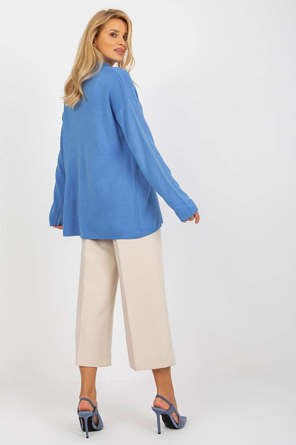 Luxurious Rue Paris Loose Cut Sweater with Heart Neckline and Long Sleeves, captured in a flattering natural light, perfect for casual elegance.