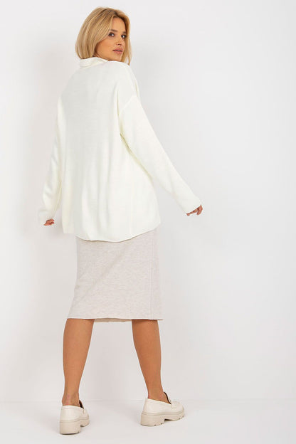 Luxurious Rue Paris Loose Cut Sweater with Heart Neckline and Long Sleeves showcased in a chic urban setting, perfect for everyday wear.