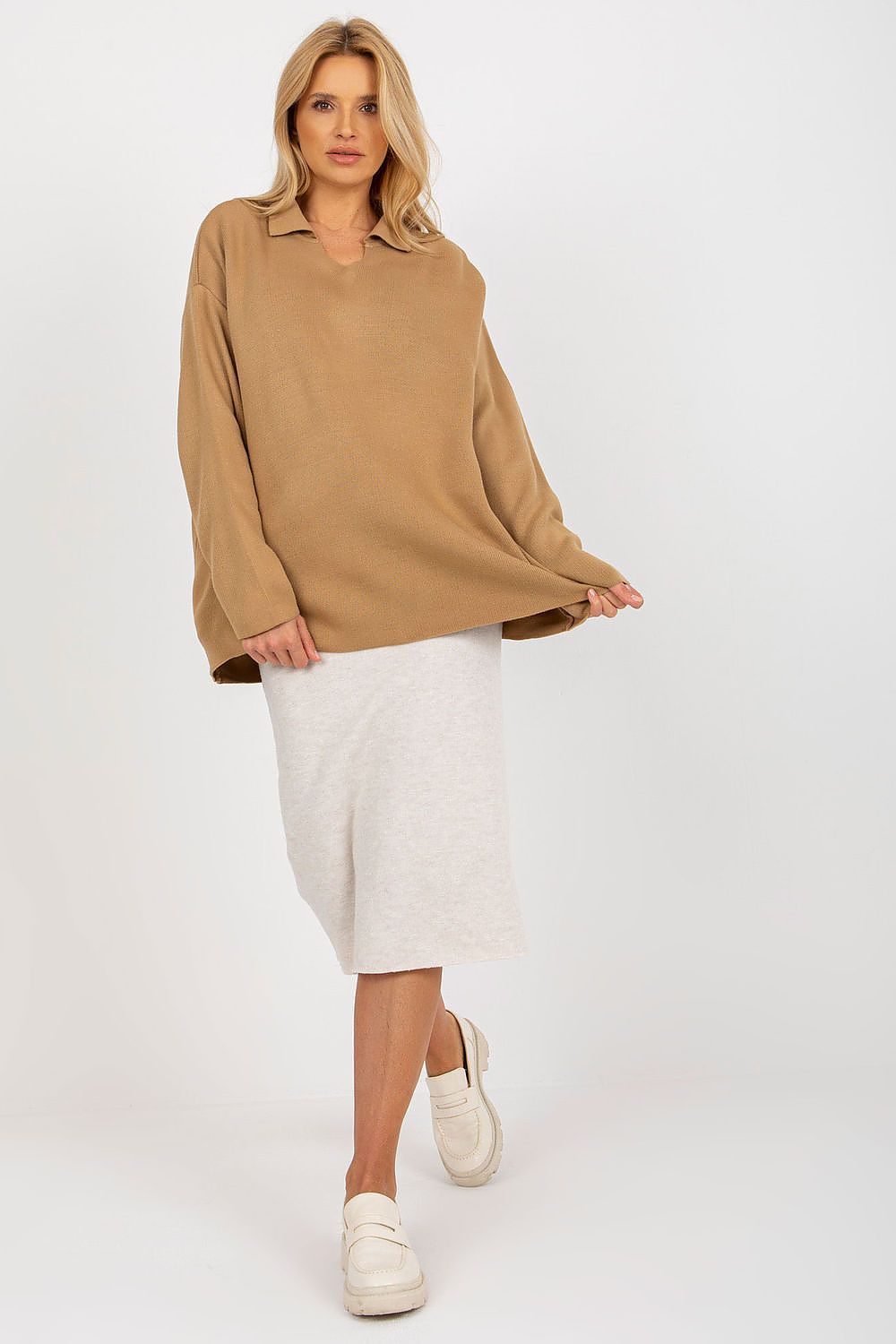 Flat lay of the Luxurious Rue Paris Loose Cut Sweater with Heart Neckline and Long Sleeves, perfect for fashion-forward everyday outfits.