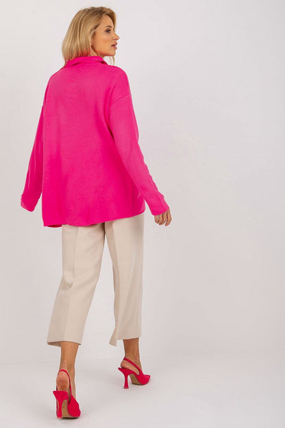 Luxurious Rue Paris Loose Cut Sweater displayed on a hanger, highlighting its exquisite heart neckline and soft fabric.