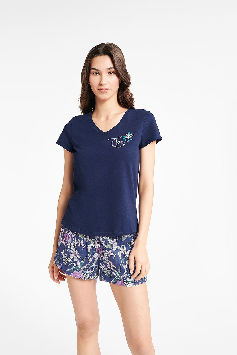 Bluebird Women's Cotton Pyjamas Set featuring a stylish V-Neck T-Shirt, designed for luxury comfort and adorned with sophisticated floral shorts.