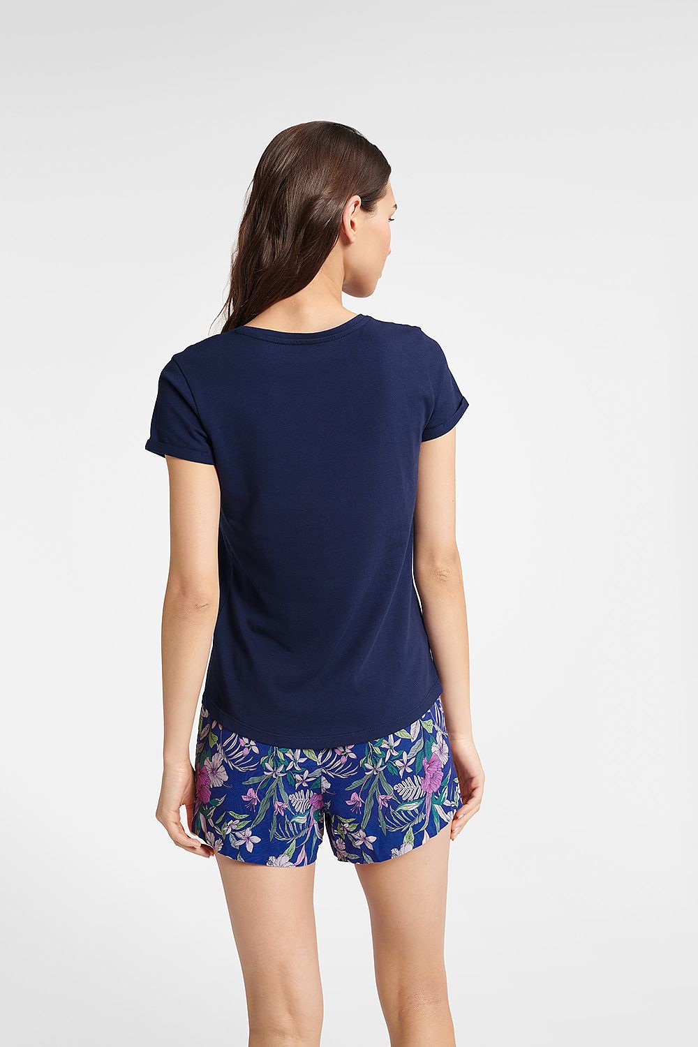 Elegant Bluebird Women's Cotton Pyjamas Set showcasing a chic V-Neck T-Shirt and vibrant floral patterned shorts for a fashionable nightwear experience.