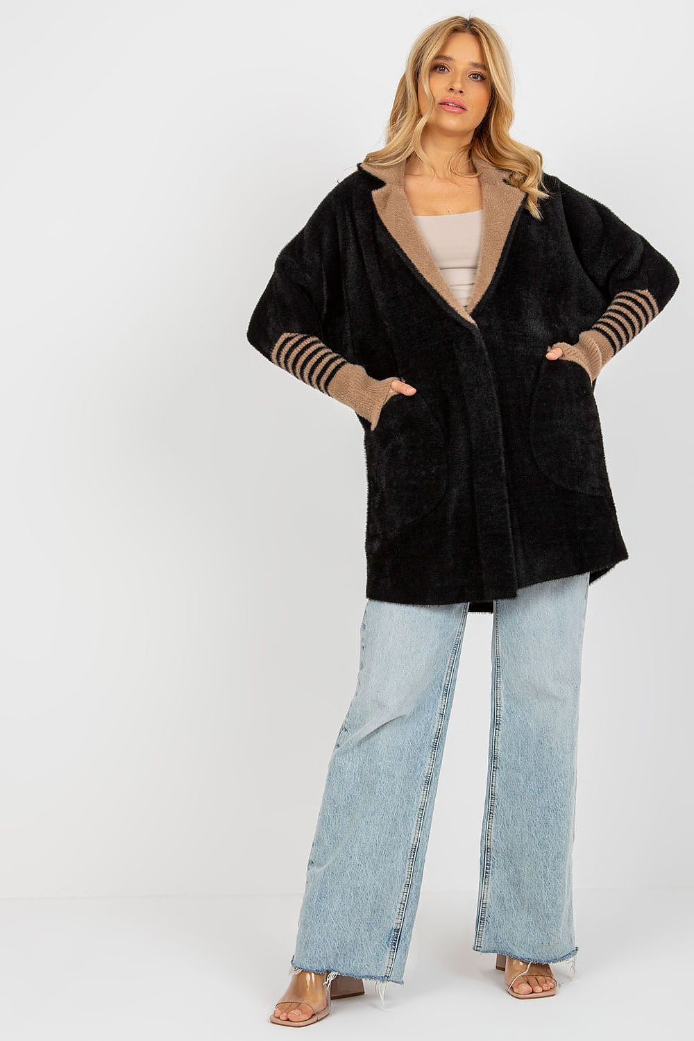 Mannequin wearing the Luxurious Women's Long Sleeve Wool Blend Coat with Large Pockets and Press Stud Fastening, demonstrating its sophisticated style.