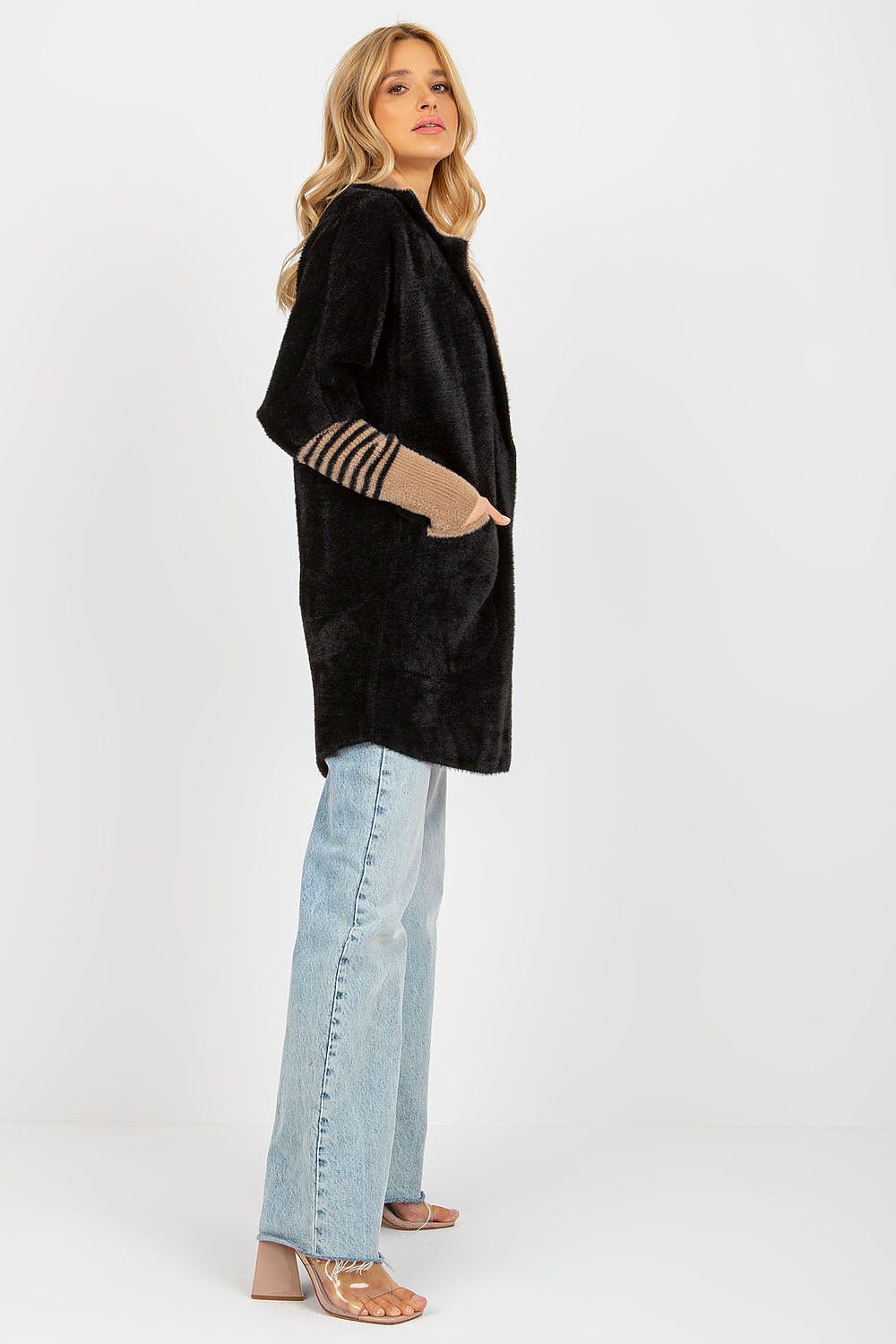 Luxurious Women's Long Sleeve Wool Blend Coat with Large Pockets and Press Stud Fastening featuring a blend of Angora, Polyester, Viscose, and Wool for ultimate comfort and style.