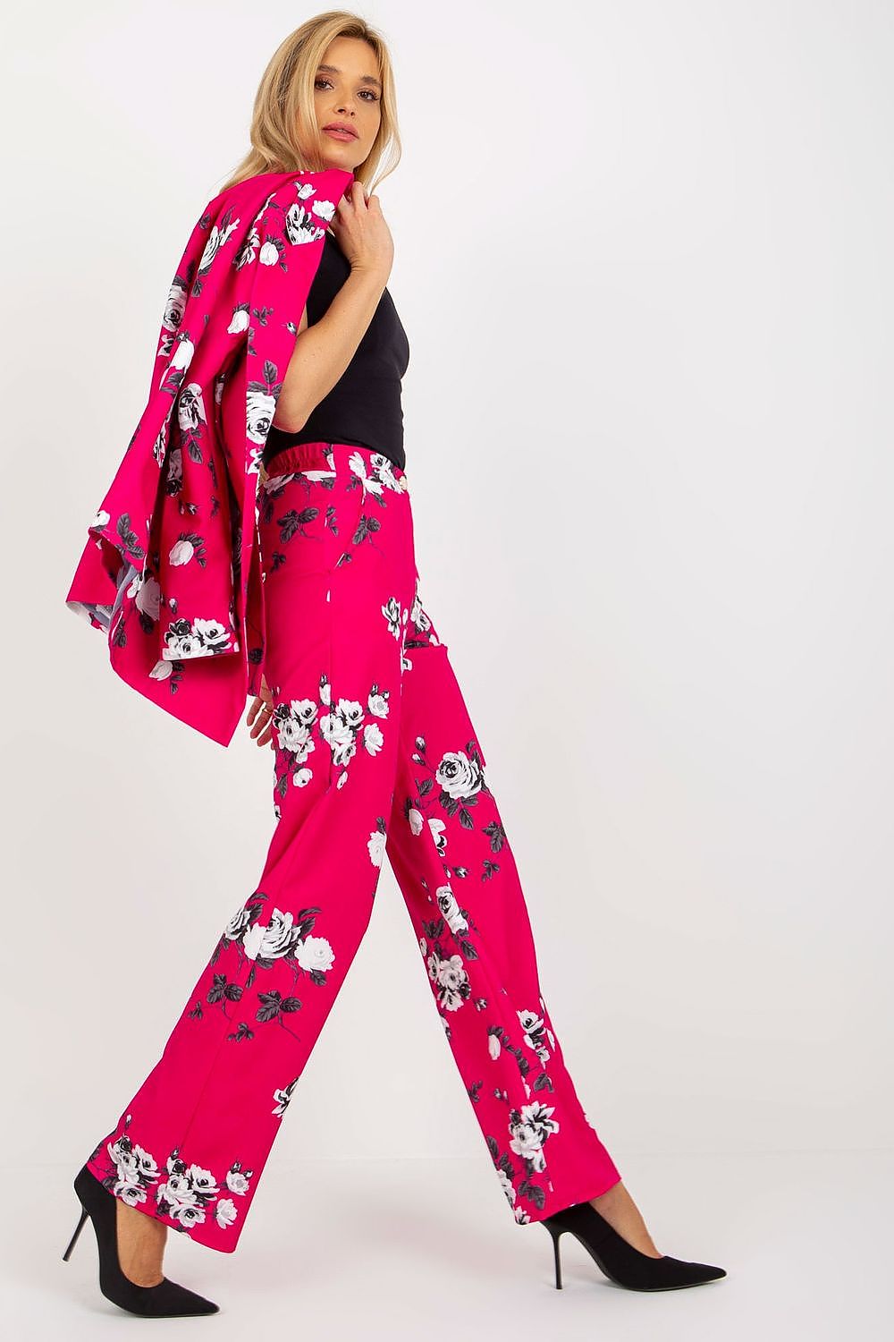 Stylish detail shot of the Elegant High-Waisted Women’s Wide-Leg Trousers by Lakerta, including zipper and button fastening, perfect for luxurious women's fashion.