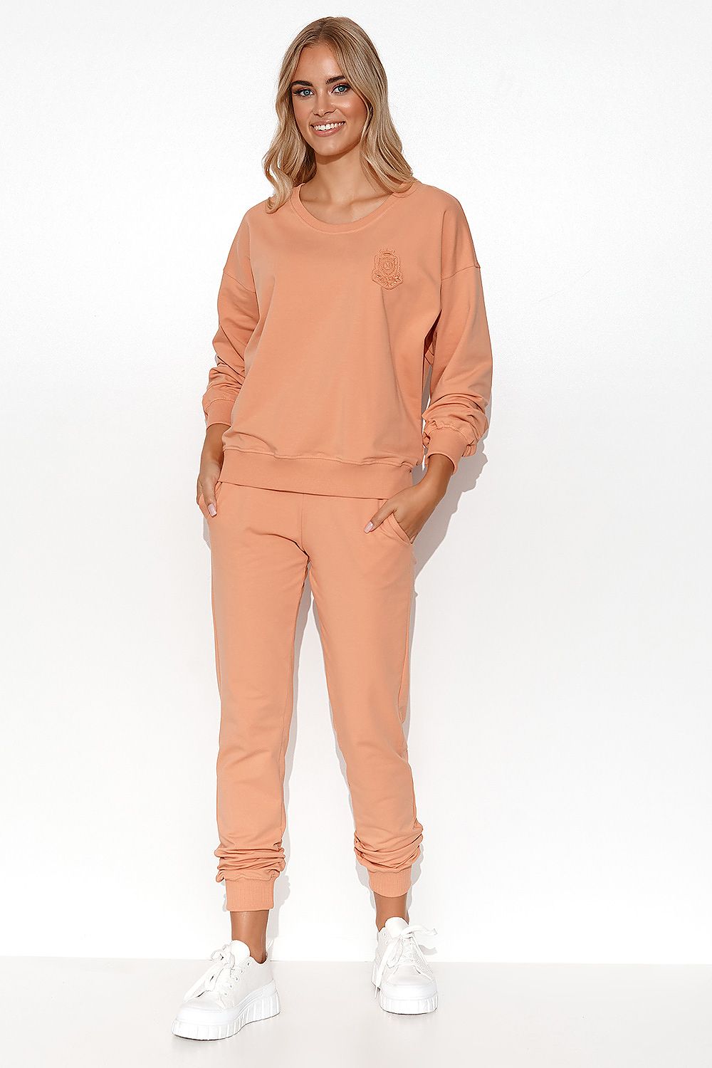 Fashionable display of Luxury Women's Lightweight Knit Sweatshirt and Pants Set, highlighting the long sleeves and comfortable fit.