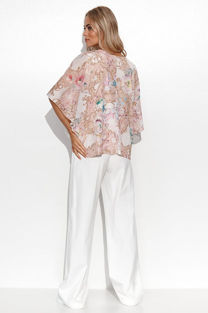 Stylish Makadamia Women's Airy Blouse with loose kimono sleeves showcasing an abstract design, ideal for enhancing feminine silhouettes.