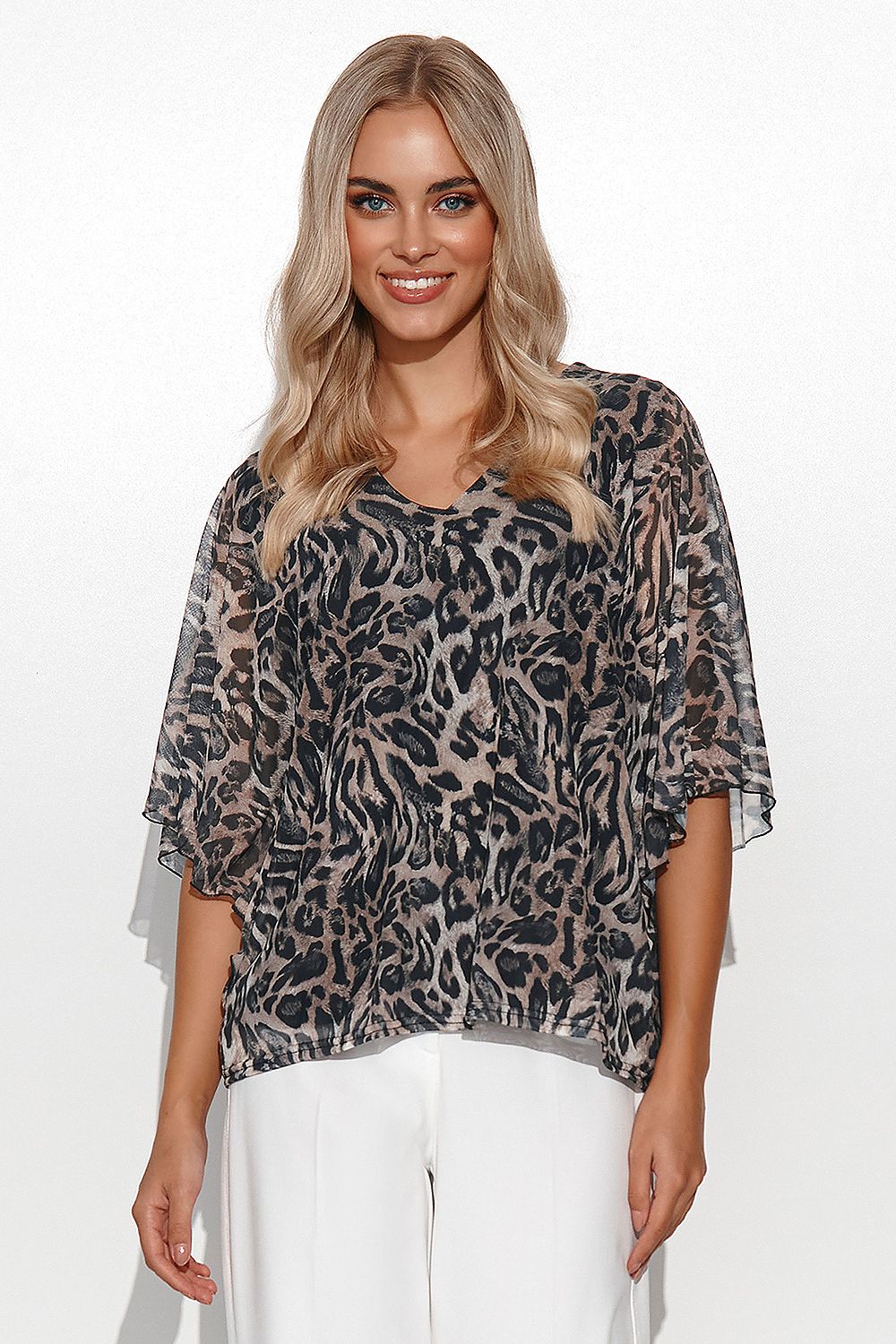 Chic Makadamia Women's Airy Blouse with kimono sleeves, heart-shaped neckline, and vibrant animal patterns, a fashionable choice for modern women.