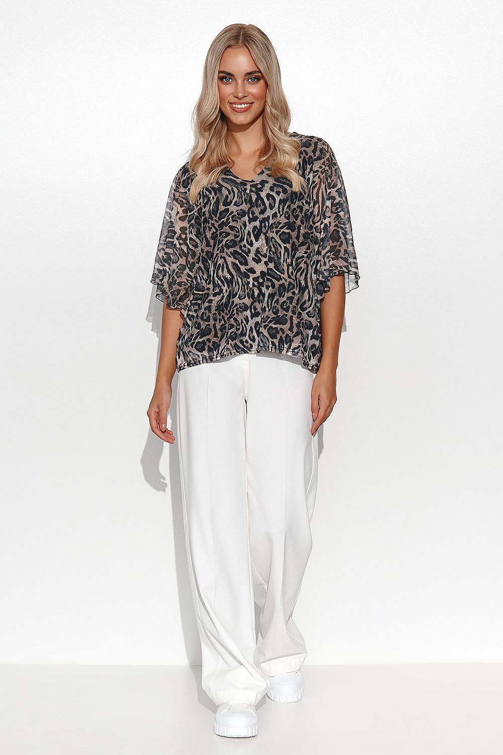 Elegant Makadamia Women's Airy Blouse, with a blend of unique patterns and a flattering heart-shaped neckline, designed for an effortless luxe style.