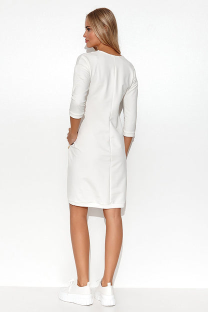 Elegant display of the Stylish Makadamia Tracksuit Dress with 3/4 sleeves, combining sporty and chic vibes, perfect for summer fashion.