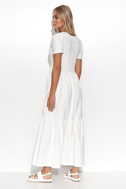 Elegant Makadamia Maxi Dress with Ruffles and V-Neckline, showcasing timeless feminine charm, perfect for any special occasion.