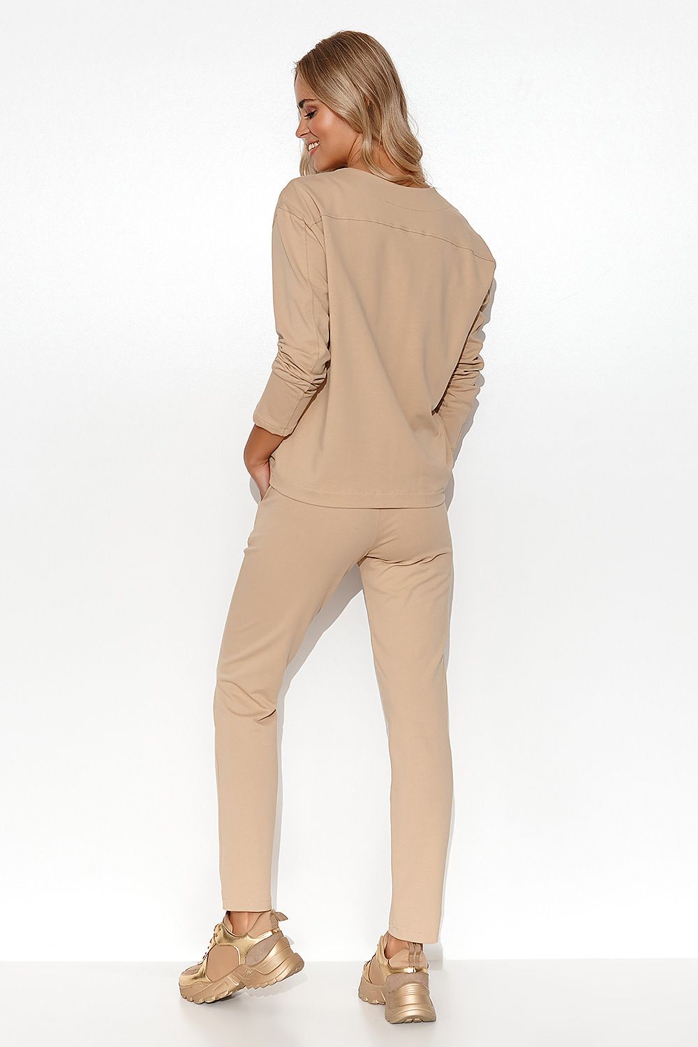Full ensemble of the Elegant Makadamia Women's Tracksuit Set with V-Neck Blouse and Straight Leg Pants, embodying modern elegance and comfort.