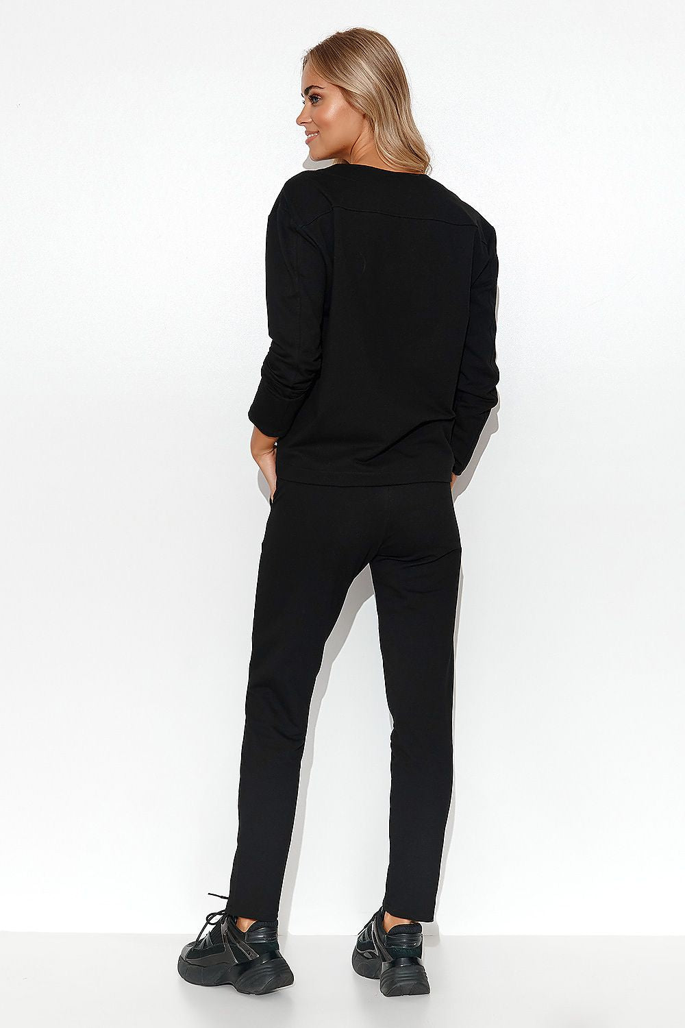 The full Elegant Makadamia Women's Tracksuit Set with the V-Neck Blouse and Straight Leg Pants, ideal for chic casual wear.